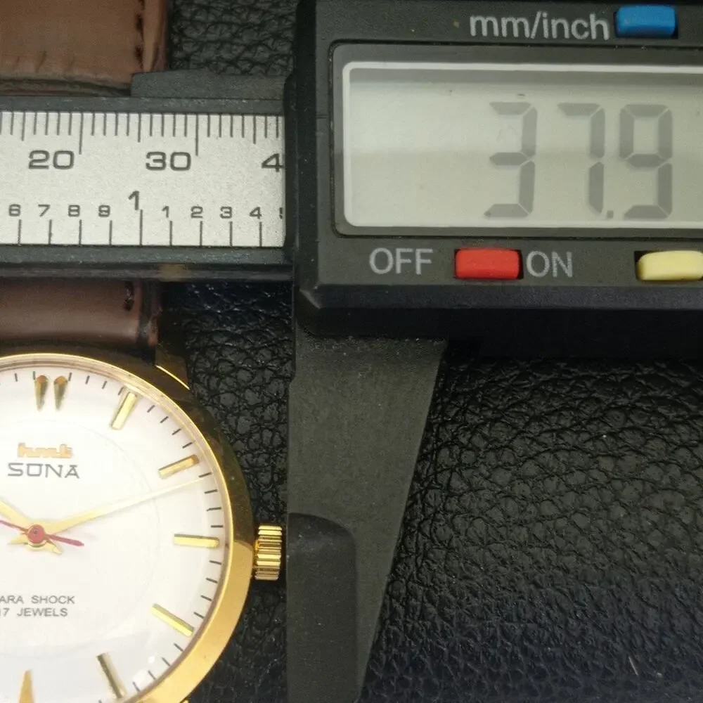 Vintage 1981 HMT Manual Wound Mens Gold Watch W/daydate & White accents